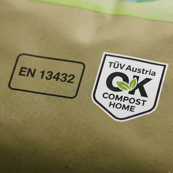 EN 13432 and TÜV Austria OK Compost Home logos on certified compostable food bags UK